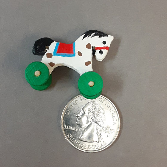 Miniature wooden toy horse