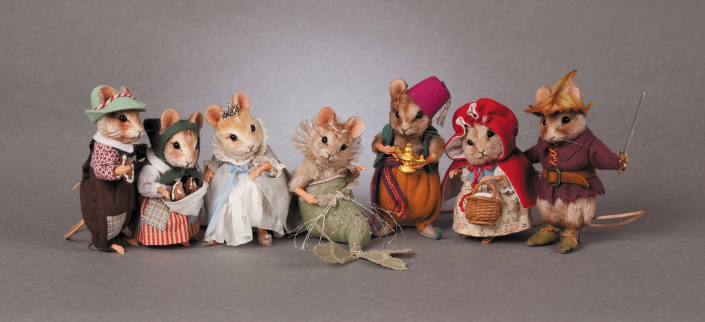 Mouse dolls dressed as fairy tale characters