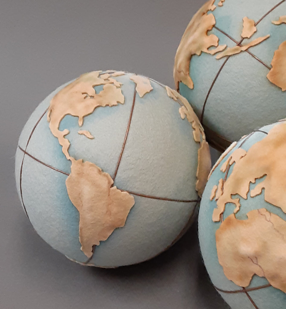 "Hugs Around The World" Model Earth