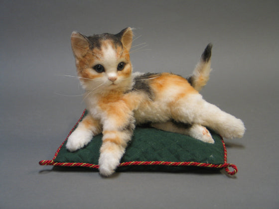plush calico kitten doll with poseable joints