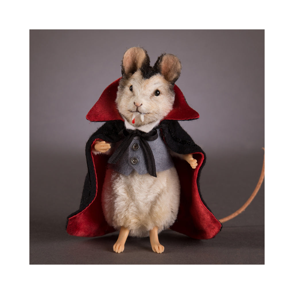 plush mouse doll dressed as count dracula