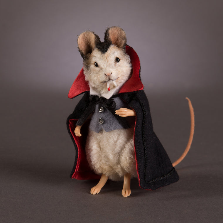 plush mouse doll dressed as count dracula