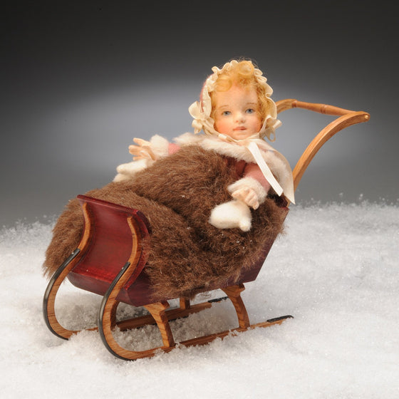 Baby Grace felt doll and sleigh