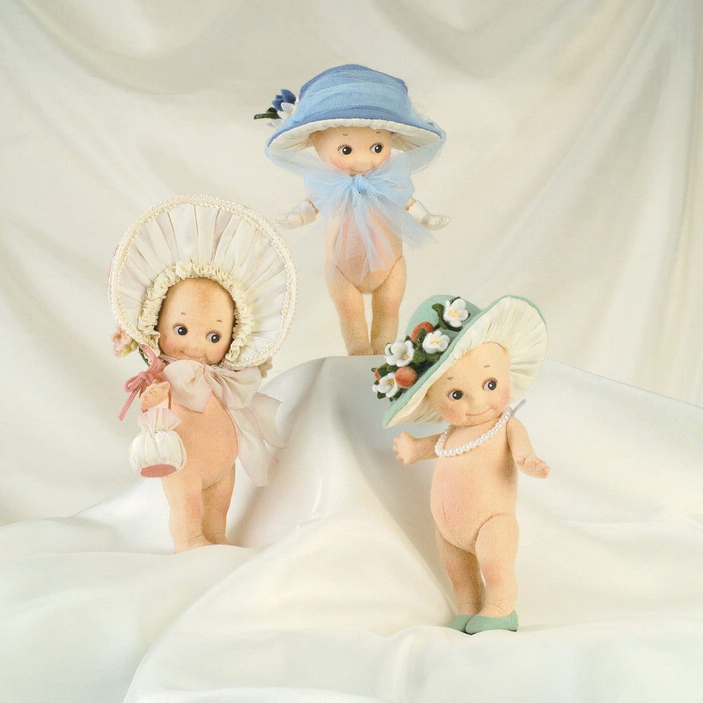 Kewpie doll with bonnet