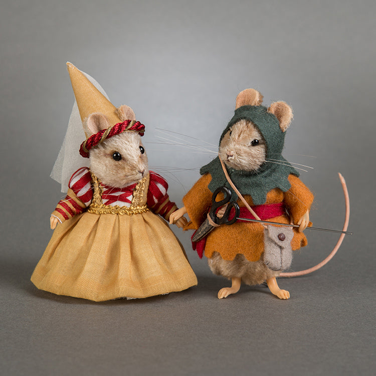 Mouse dolls dressed as the brave little tailor and princess