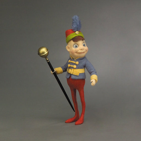 Mace Brownie™ felt doll dressed as marching band leader